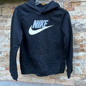 Nike swoosh. Looks new. Barely used. Kids XL